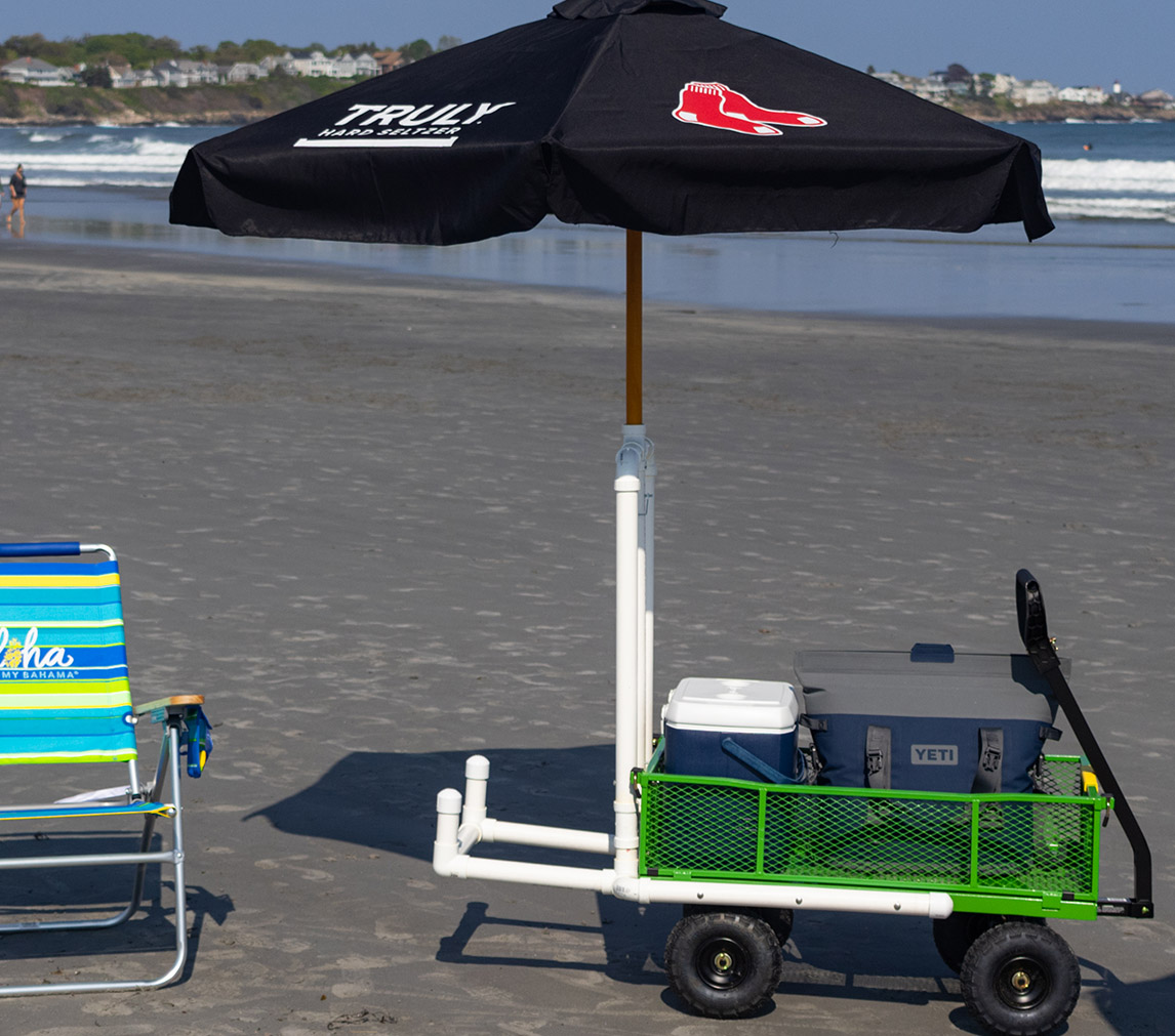 Beach wagon store with umbrella holder